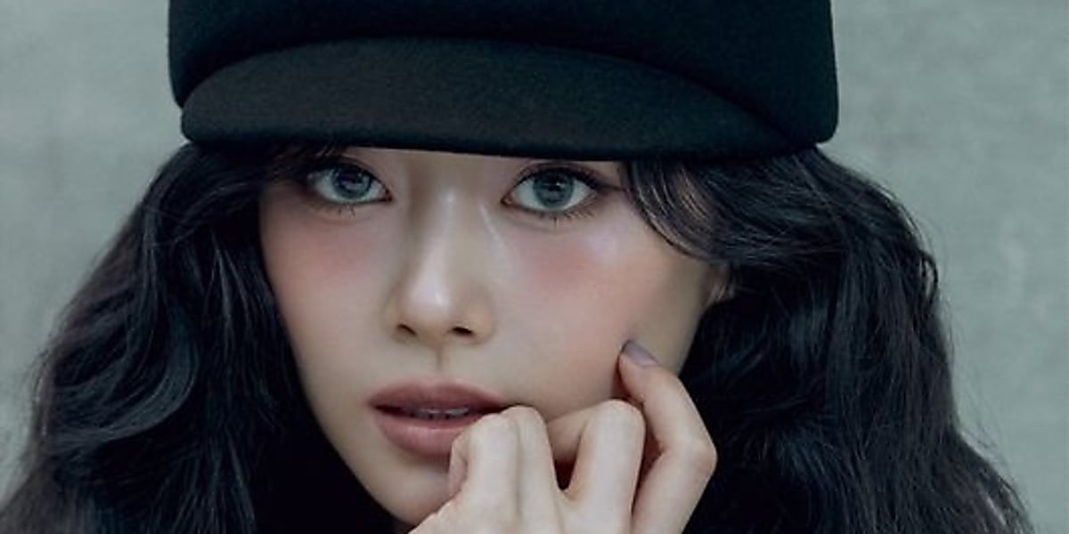 Tzuyu of TWICE captivates with her mature charm in a COSMOPOLITAN KOREA feature, discussing her solo album and group bond.