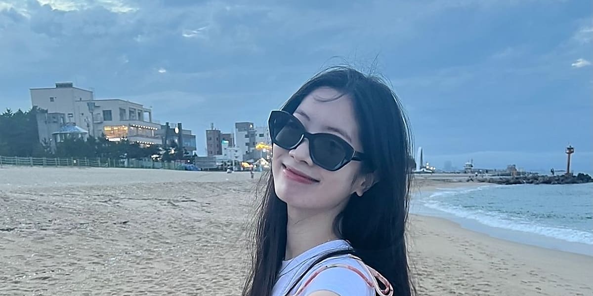 TWICE's Dahyun shares adorable beach photos on Instagram, showcasing her style and recent modeling work in New York.