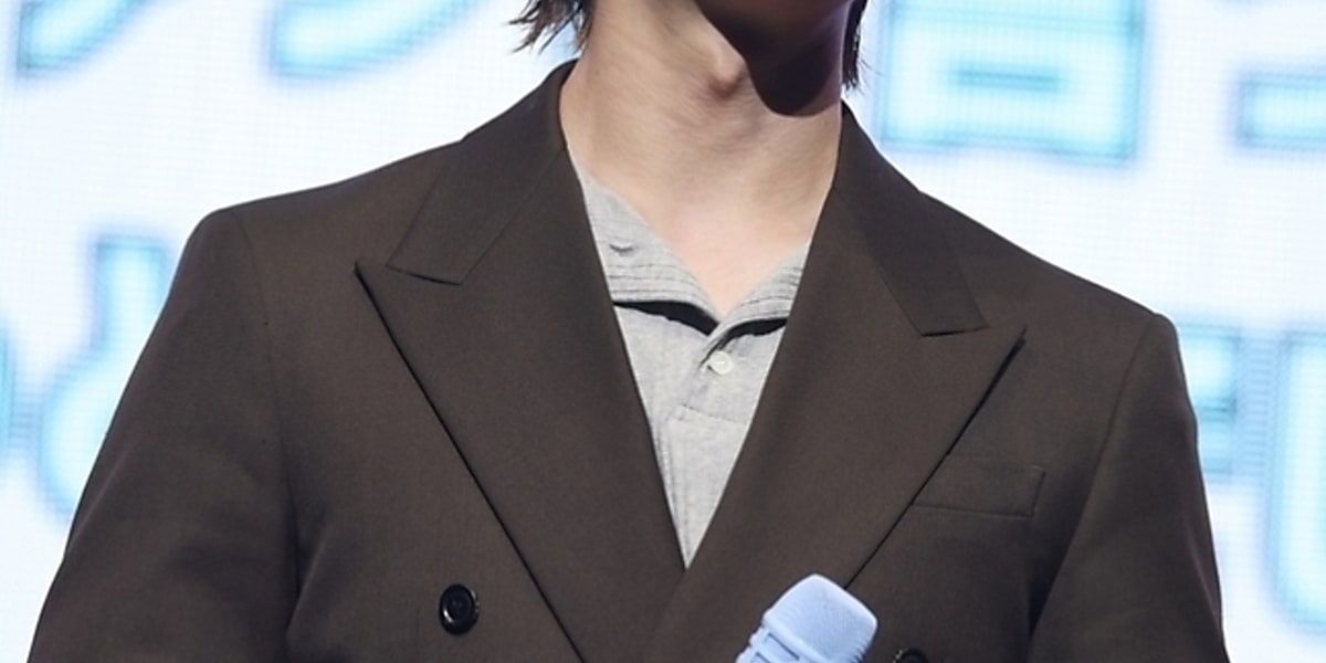 SHINee's ONEW held a successful fan concert in Japan, showcasing his energy and engaging with fans through various activities.