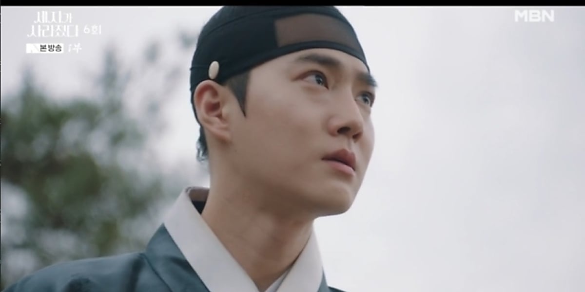 EXO's Suho captivates in drama as Lee Gon, facing palace secrets and kidnappings, promising to return despite crisis.