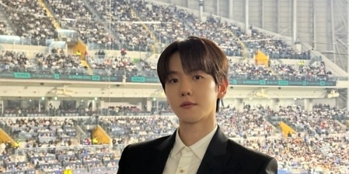 EXO's Baekhyun captivates baseball fans with his singing at "MLB World Tour Seoul Series 2024" in Seoul, gaining attention on MLB's official SNS and in Japan.