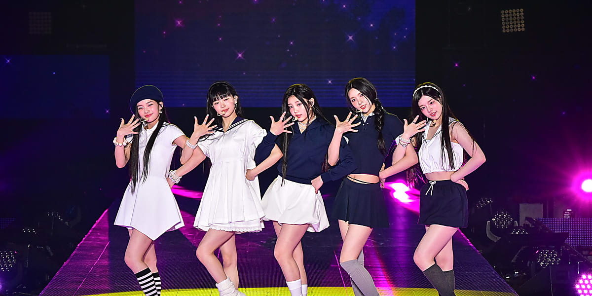 ILLIT debuts in Japan at Rakuten GirlsAward 2024, captivating the audience with their energetic performance and hit song "Magnetic."