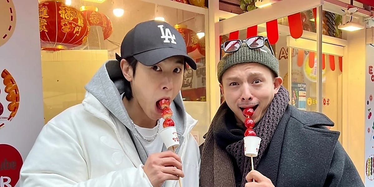 Tohoshinki's Yunho reunites with actor Masaki Suda in Korea, enjoying strawberry tanghulu and taking photos with Seoul Tower.