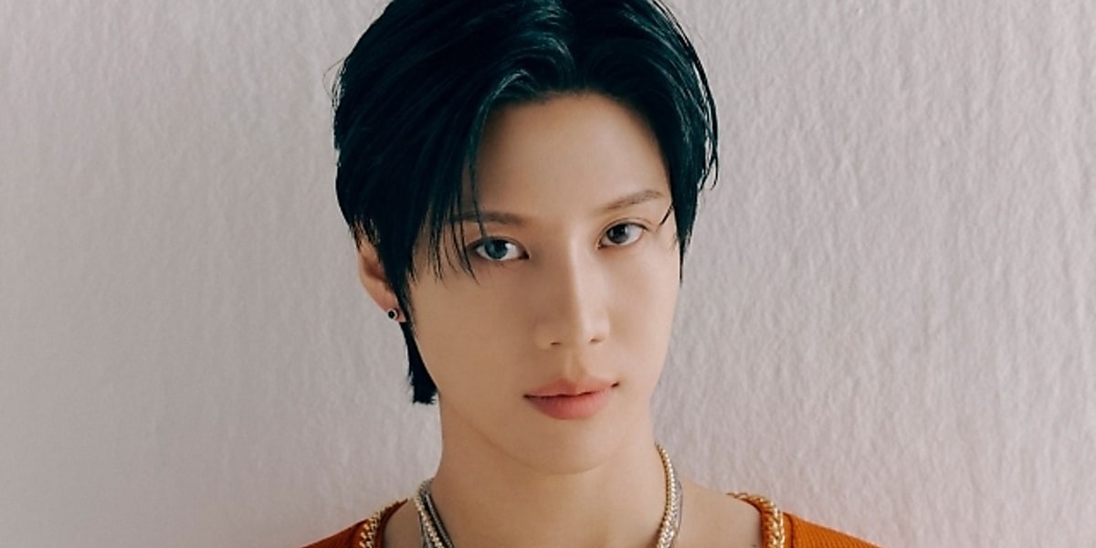 SHINee's Taemin reveals "TAEMate" fan club name and logo, exciting fans for future activities.