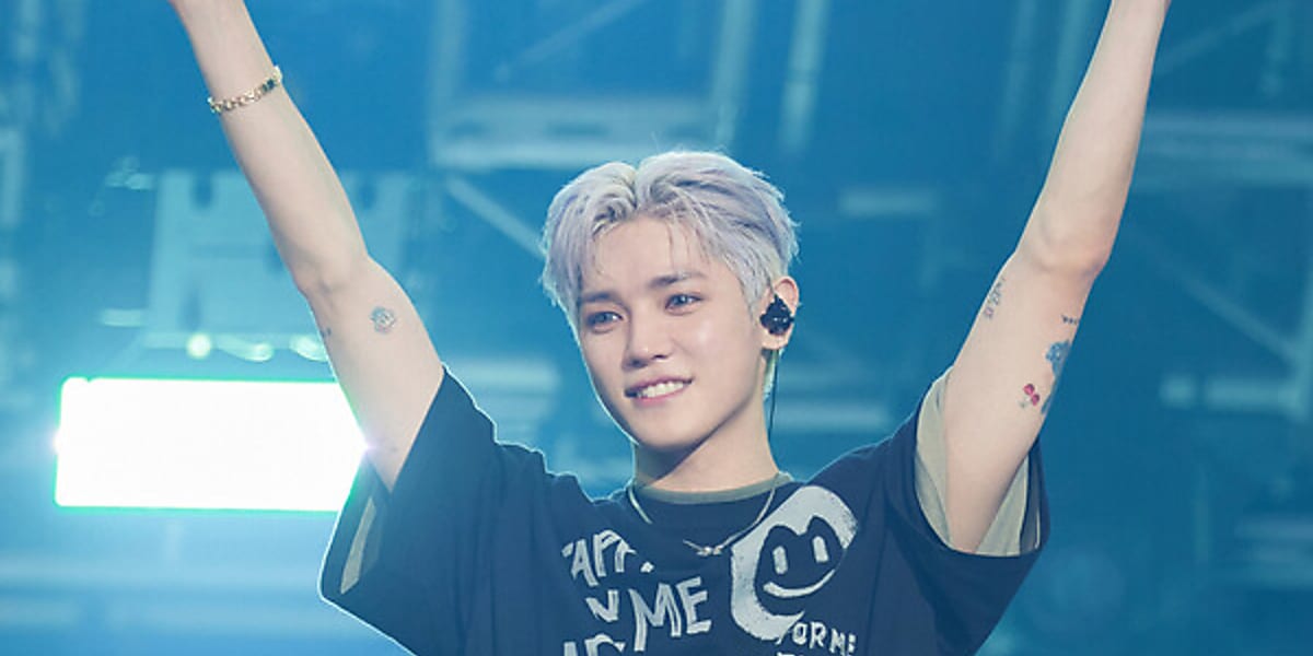 Taeyong's first solo concert sells out both days, showcasing his musical journey and emotional performances.
