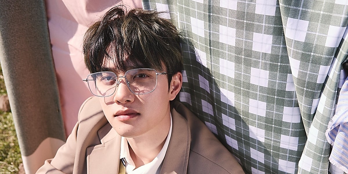 EXO's Dio releases concept photos for 3rd mini album "Growth," showcasing youthful beauty and a "nerd beauty" vibe, raising expectations for new content.